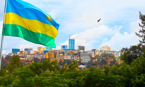 Kigali's hills with the Rwandan flag in the foreground